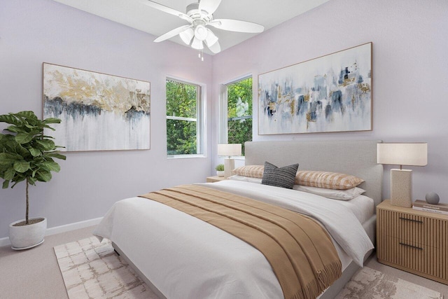 carpeted bedroom with a ceiling fan and baseboards