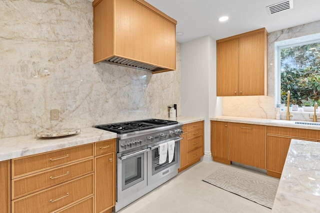5 Osprey Ct, Ocean Ridge, FL 33435 - kitchen with double oven range, premium range hood, backsplash, and a sink