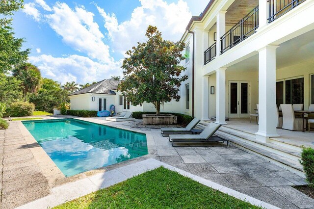 5 Osprey Ct, Ocean Ridge, FL 33435 - outdoor pool featuring french doors and a patio