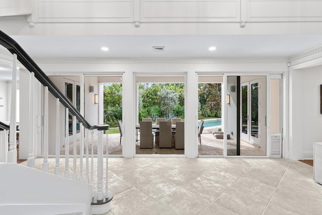 5 Osprey Ct, Ocean Ridge, FL 33435 - foyer with healthy amount of natural light, stairway, and recessed lighting