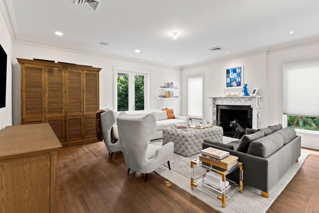 5 Osprey Ct, Ocean Ridge, FL 33435 - living room with wood finished floors, a premium fireplace, crown molding, and recessed lighting