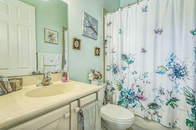 694 Cresta Cir, West Palm Beach, FL 33413 - bathroom with shower / bath combo, vanity, and toilet