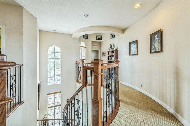 694 Cresta Cir, West Palm Beach, FL 33413 - hall featuring recessed lighting, baseboards, carpet, and an upstairs landing