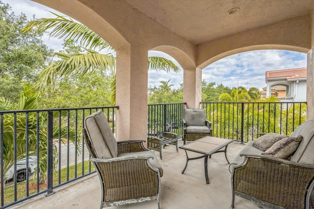 694 Cresta Cir, West Palm Beach, FL 33413 - balcony featuring outdoor lounge area