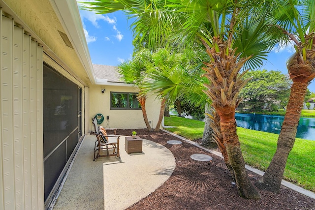 view of patio / terrace with a water view