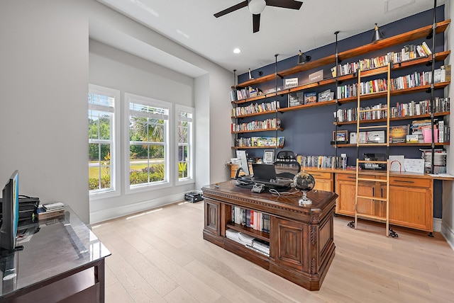 office featuring light wood-style flooring, ceiling fan, recessed lighting, and baseboards