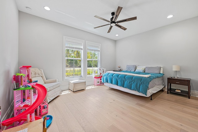 bedroom with recessed lighting, hardwood / wood-style floors, and ceiling fan
