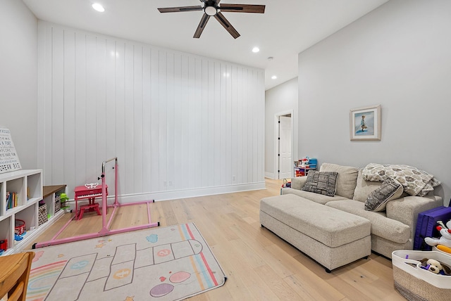 rec room with recessed lighting, a ceiling fan, wood finished floors, and baseboards