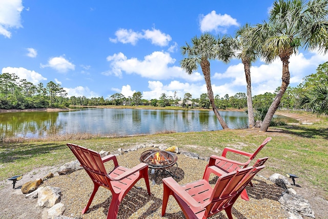 view of water feature with an outdoor fire pit