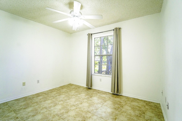 1142 SW Dalton Ave, Port Saint Lucie, FL 34953 - unfurnished room featuring a ceiling fan, a textured ceiling, and baseboards