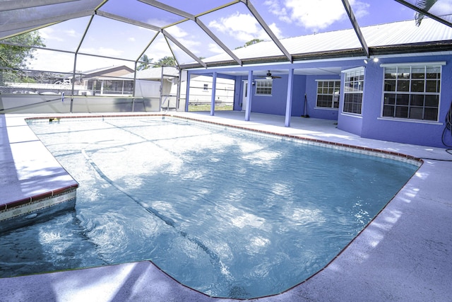 1142 SW Dalton Ave, Port Saint Lucie, FL 34953 - pool with a patio, a ceiling fan, and glass enclosure