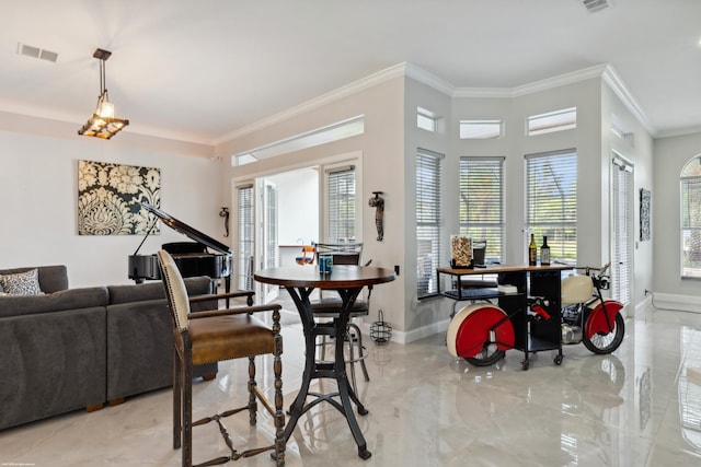 19361 W Sycamore Dr, The Acreage, FL 33470 - dining space featuring marble finish floor, baseboards, ornamental molding, and visible vents