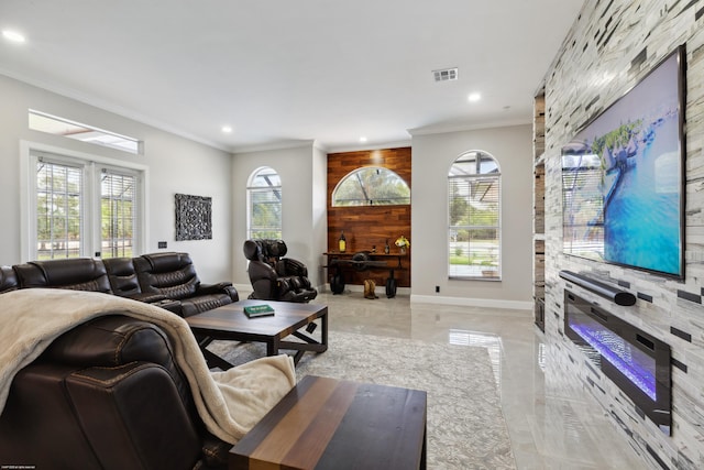 19361 W Sycamore Dr, The Acreage, FL 33470 - living room featuring crown molding, baseboards, recessed lighting, and plenty of natural light