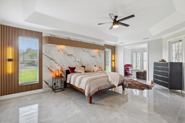 19361 W Sycamore Dr, The Acreage, FL 33470 - bedroom featuring ceiling fan, a raised ceiling, and marble finish floor