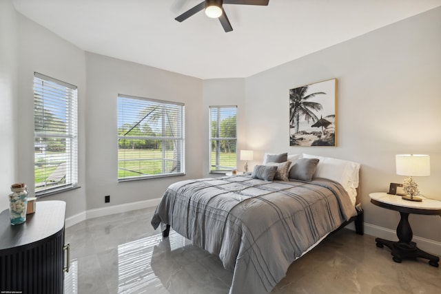 19361 W Sycamore Dr, The Acreage, FL 33470 - bedroom with baseboards and ceiling fan