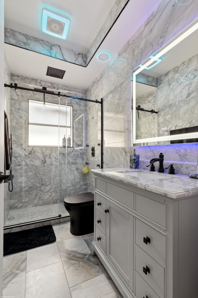 19361 W Sycamore Dr, The Acreage, FL 33470 - full bath featuring toilet, vanity, tile walls, and a stall shower