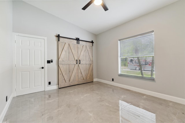 19361 W Sycamore Dr, The Acreage, FL 33470 - empty room with baseboards, a ceiling fan, marble finish floor, and lofted ceiling