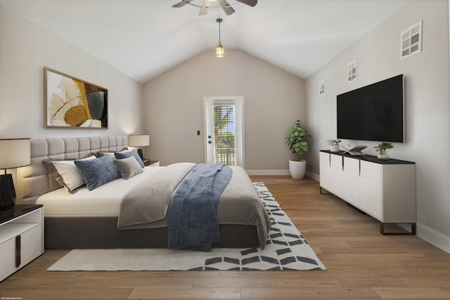 19361 W Sycamore Dr, The Acreage, FL 33470 - bedroom with visible vents, baseboards, wood finished floors, and lofted ceiling