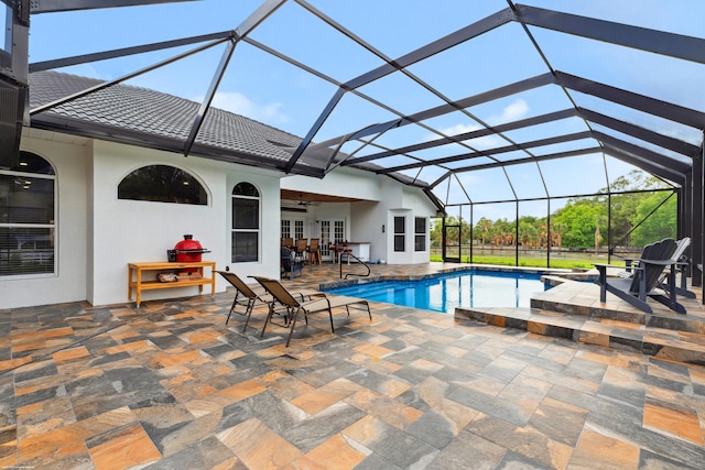 19361 W Sycamore Dr, The Acreage, FL 33470 - outdoor pool with a patio, french doors, a lanai, and ceiling fan