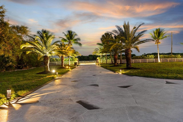 19361 W Sycamore Dr, The Acreage, FL 33470 - surrounding community featuring driveway, fence, and a lawn