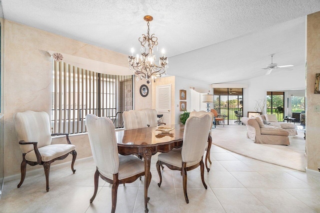 15310 Strathearn Dr Unit 11504, Delray Beach, FL 33446 - dining space featuring light tile patterned floors, baseboards, a textured ceiling, and ceiling fan with notable chandelier