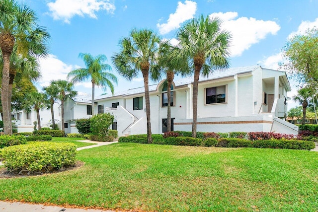 15310 Strathearn Dr Unit 11504, Delray Beach, FL 33446 - view of front of property featuring a front yard and stucco siding