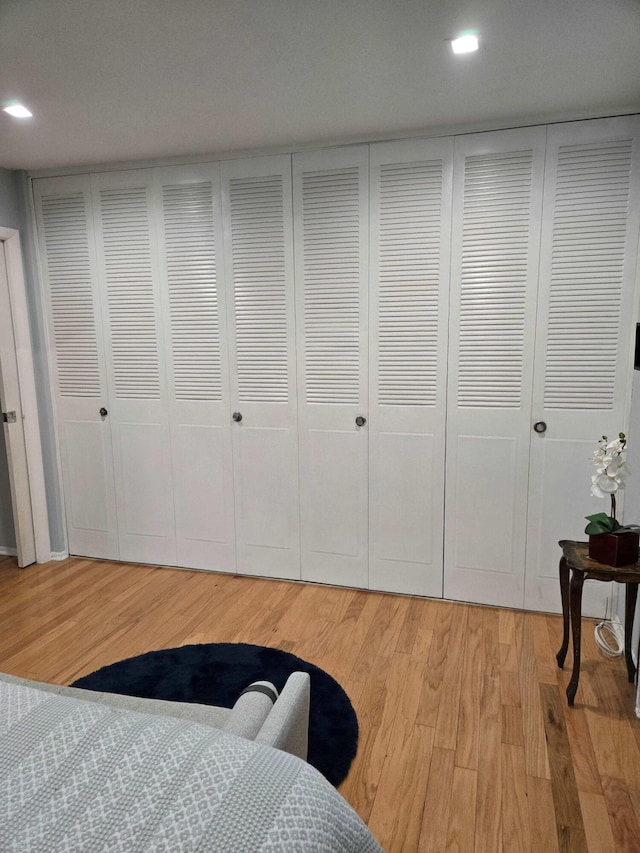 2970 E Ashley Dr E Unit B, West Palm Beach, FL 33415 - bedroom featuring light wood-style flooring and recessed lighting