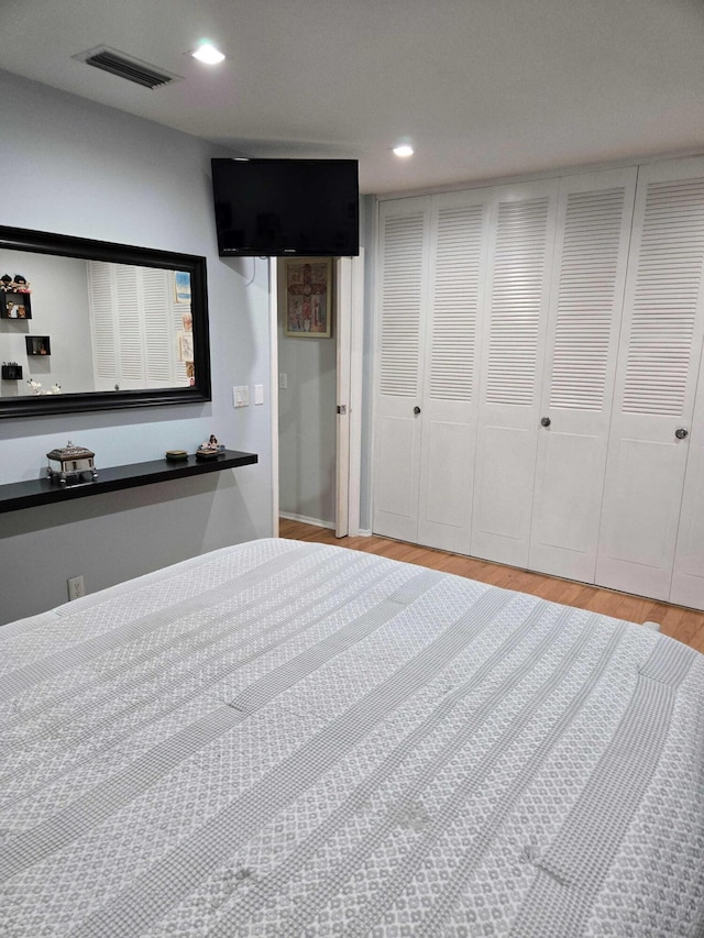 2970 E Ashley Dr E Unit B, West Palm Beach, FL 33415 - bedroom featuring wood finished floors and recessed lighting