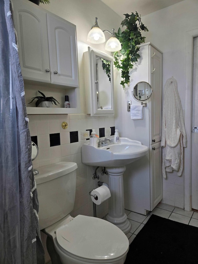 2970 E Ashley Dr E Unit B, West Palm Beach, FL 33415 - bathroom featuring tile patterned flooring and toilet