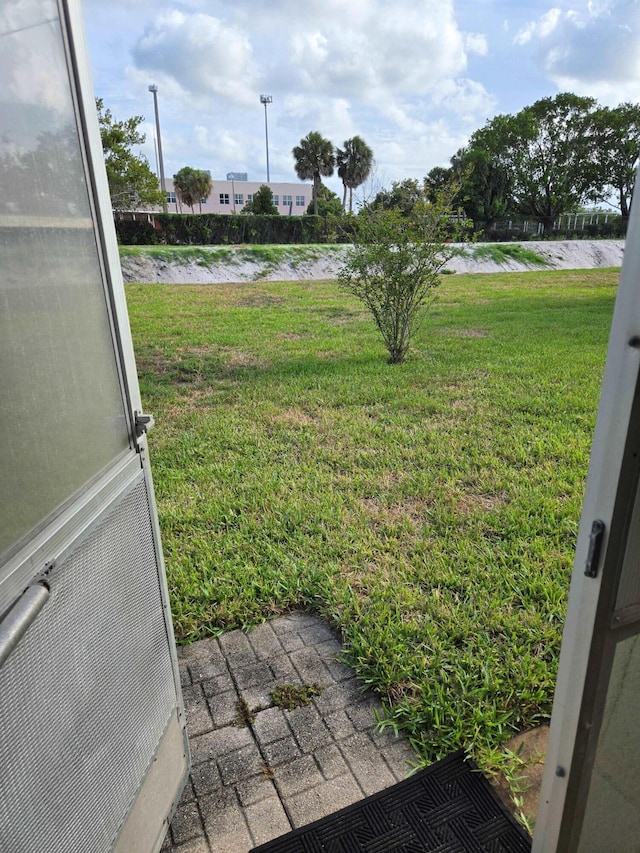 2970 E Ashley Dr E Unit B, West Palm Beach, FL 33415 - view of green lawn