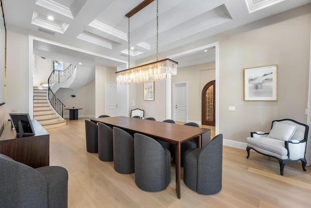 251 W Coconut Palm Rd, Boca Raton, FL 33432 - dining room featuring beam ceiling, baseboards, light wood-type flooring, stairway, and coffered ceiling