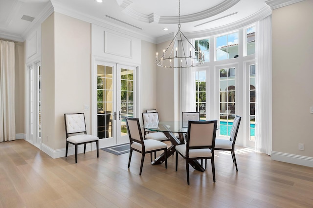 251 W Coconut Palm Rd, Boca Raton, FL 33432 - dining area with ornamental molding, light wood-style floors, recessed lighting, french doors, and a notable chandelier