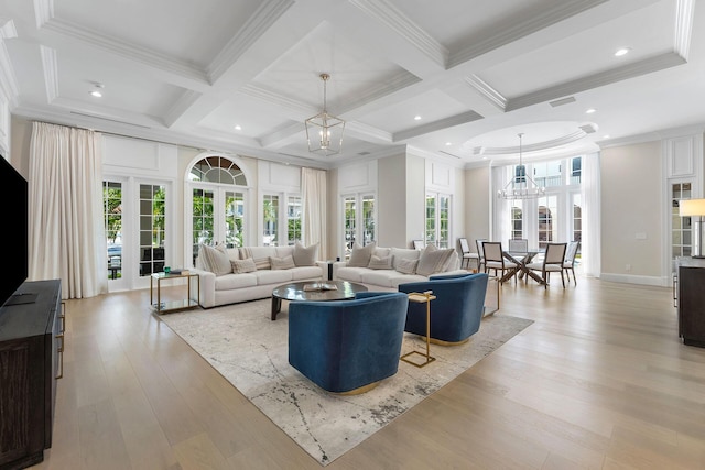 251 W Coconut Palm Rd, Boca Raton, FL 33432 - living area with plenty of natural light, coffered ceiling, and light wood-style flooring