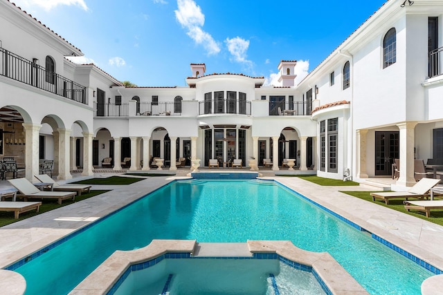 251 W Coconut Palm Rd, Boca Raton, FL 33432 - view of pool with a patio and a pool with connected hot tub