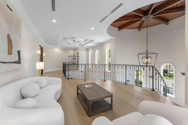 251 W Coconut Palm Rd, Boca Raton, FL 33432 - living room with crown molding, wood finished floors, beamed ceiling, recessed lighting, and a notable chandelier
