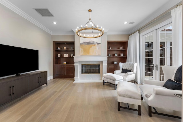 251 W Coconut Palm Rd, Boca Raton, FL 33432 - living room with crown molding, a notable chandelier, visible vents, and light wood-type flooring