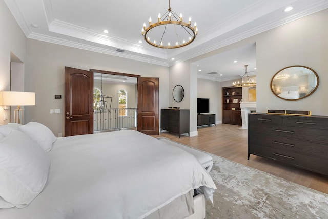 251 W Coconut Palm Rd, Boca Raton, FL 33432 - bedroom featuring a raised ceiling, baseboards, light wood finished floors, and a chandelier