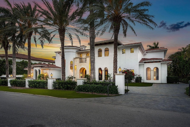 251 W Coconut Palm Rd, Boca Raton, FL 33432 - mediterranean / spanish-style house featuring a tile roof and stucco siding