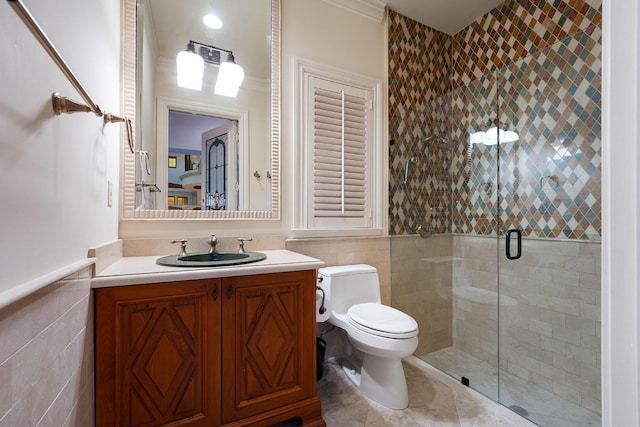 251 W Coconut Palm Rd, Boca Raton, FL 33432 - full bathroom featuring vanity, toilet, tile walls, a wainscoted wall, and a shower stall