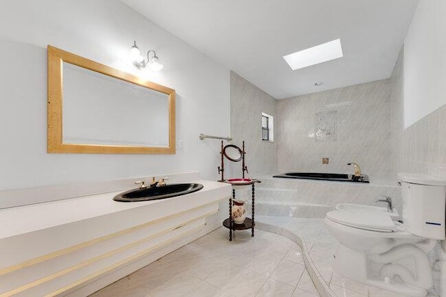 3682 W 2nd Ave, Hialeah, FL 33012 - full bath with a skylight, toilet, a relaxing tiled tub, tile patterned floors, and vanity
