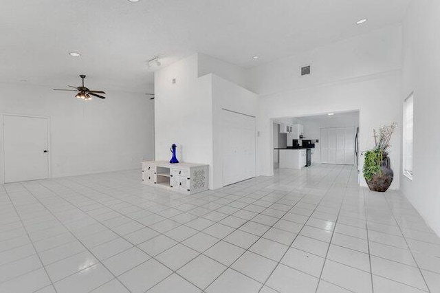 3682 W 2nd Ave, Hialeah, FL 33012 - unfurnished living room featuring light tile patterned floors, a ceiling fan, and recessed lighting