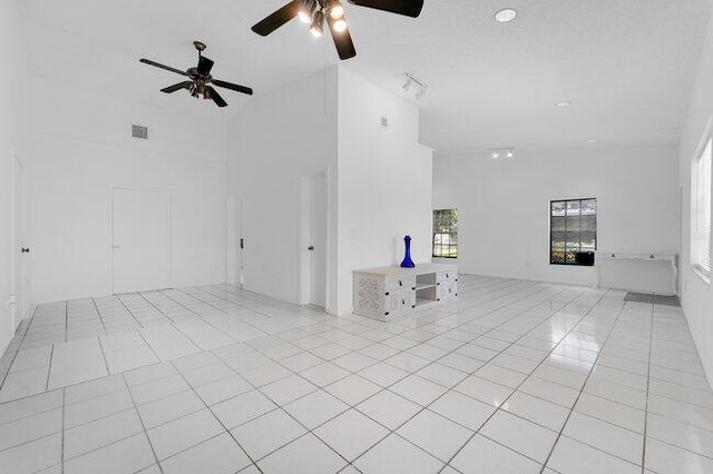 3682 W 2nd Ave, Hialeah, FL 33012 - unfurnished room with ceiling fan, light tile patterned floors, high vaulted ceiling, and recessed lighting