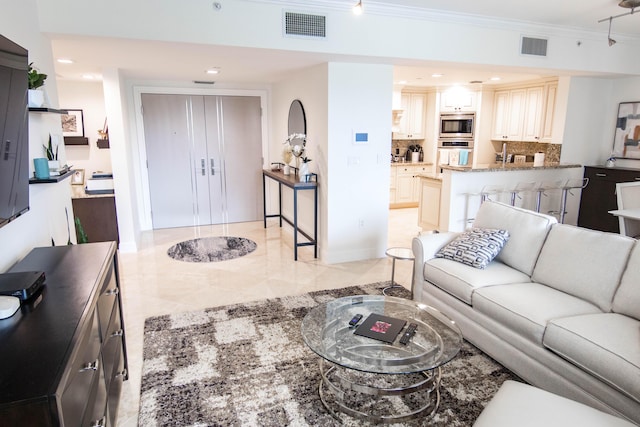 200 E Palmetto Park Rd Unit 503, Boca Raton, FL 33432 - living area featuring baseboards, crown molding, visible vents, and recessed lighting