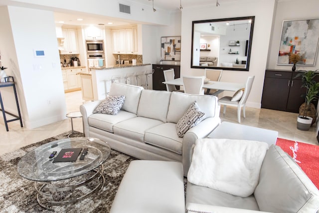 200 E Palmetto Park Rd Unit 503, Boca Raton, FL 33432 - living area with baseboards, ornamental molding, visible vents, and recessed lighting