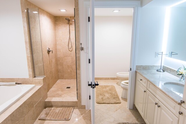 200 E Palmetto Park Rd Unit 503, Boca Raton, FL 33432 - bathroom featuring a bidet, a tile shower, tile patterned flooring, toilet, and vanity