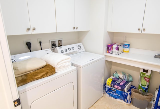 200 E Palmetto Park Rd Unit 503, Boca Raton, FL 33432 - clothes washing area with cabinet space and washer and dryer