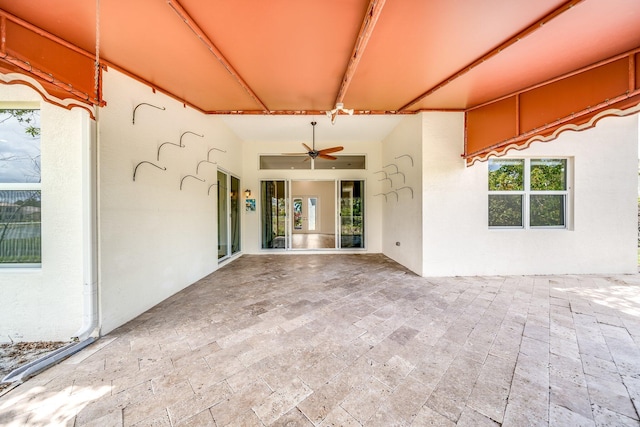 view of patio featuring a ceiling fan