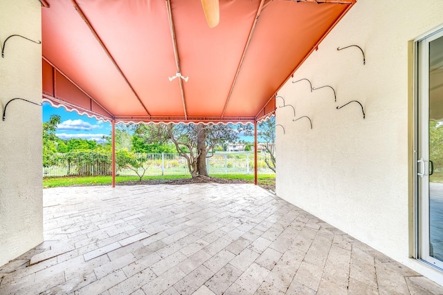 view of patio / terrace featuring fence
