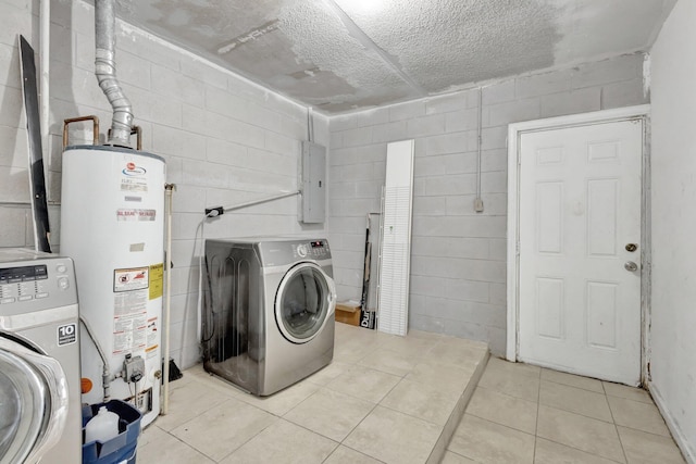 clothes washing area featuring washer / clothes dryer, laundry area, electric panel, and water heater