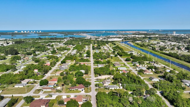 bird's eye view with a residential view and a water view